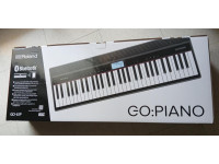 broland-go-piano-61-go-61p-conjunto-piano-portatil-e-saco-transporte-roland-cb-gokp61-b_685e48788f822.jpg
